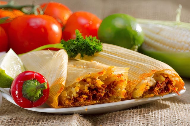 Tamale on the husk.